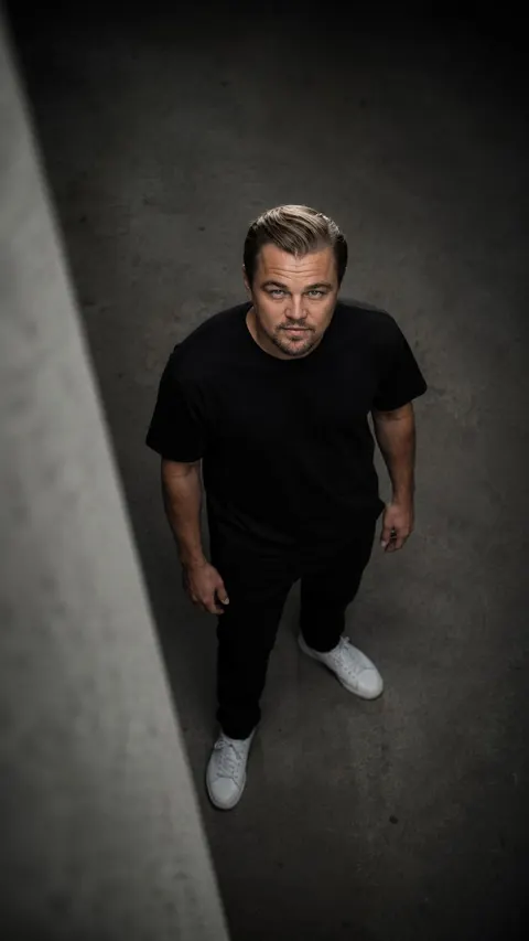 Leonardo DiCaprio — high-angle looking-up moody portrait, AI-generated