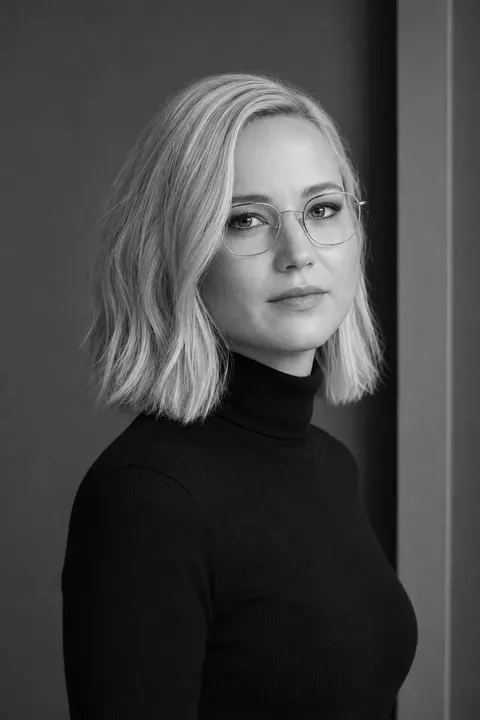Jennifer Lawrence monochrome turtleneck portrait — variation 4, AI-generated