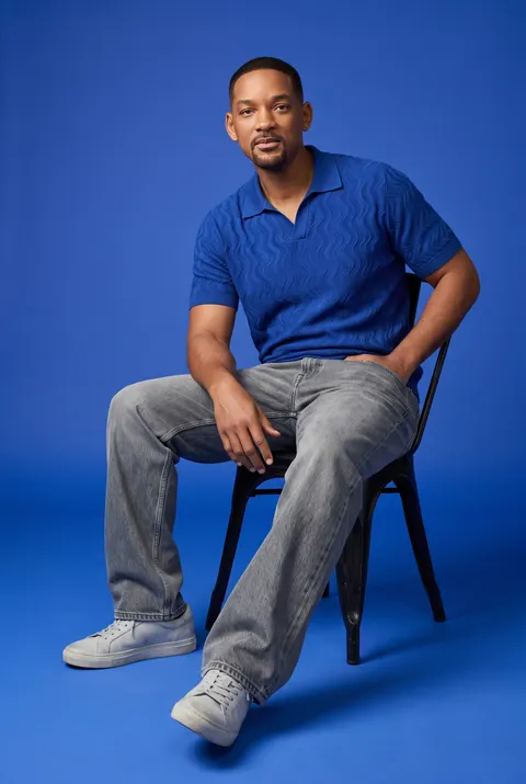 Will Smith — royal blue streetwear seated portrait, AI-generated
