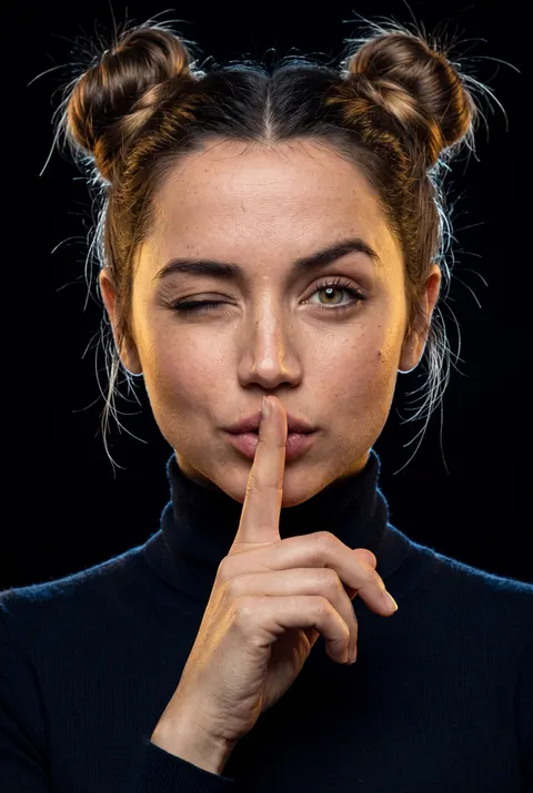 Ana de Armas — shh wink portrait with space buns, AI-generated