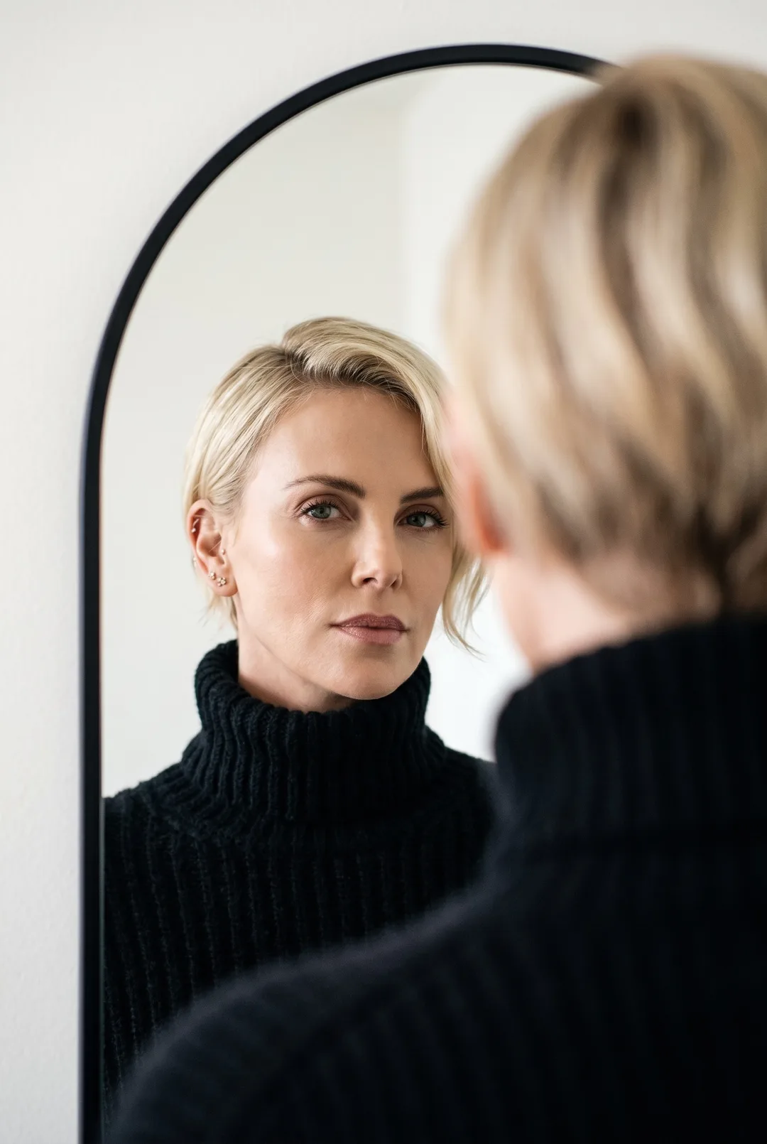 Charlize Theron — mirror-gaze editorial portrait, AI-generated