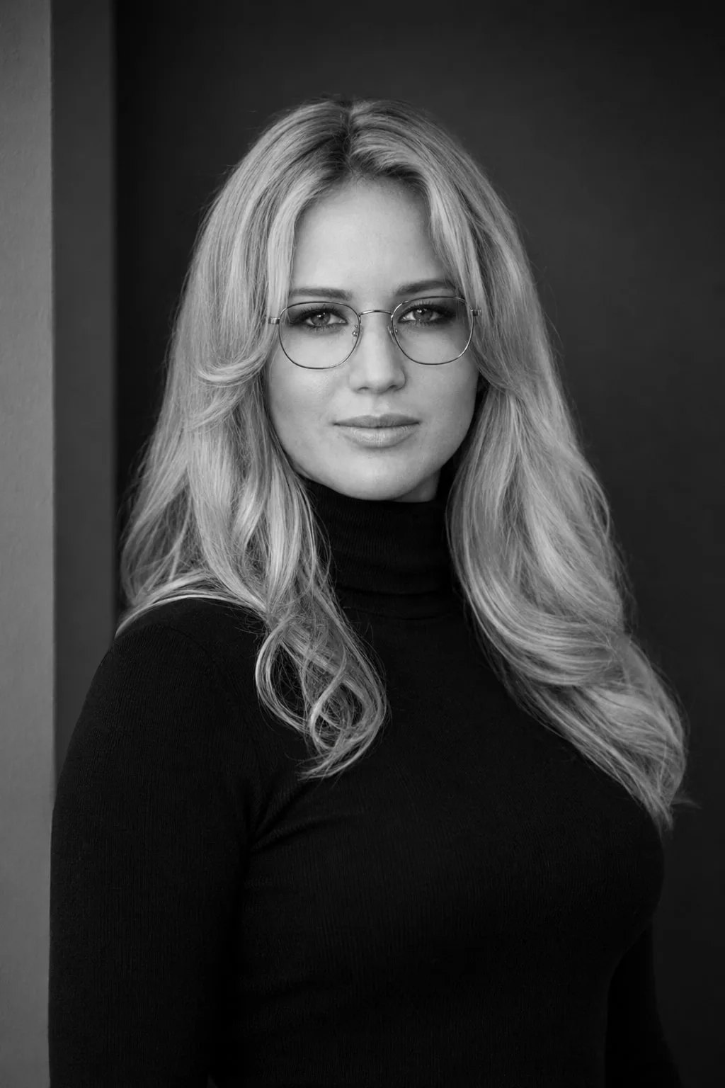Jennifer Lawrence — monochrome turtleneck portrait in a modern interior, AI-generated